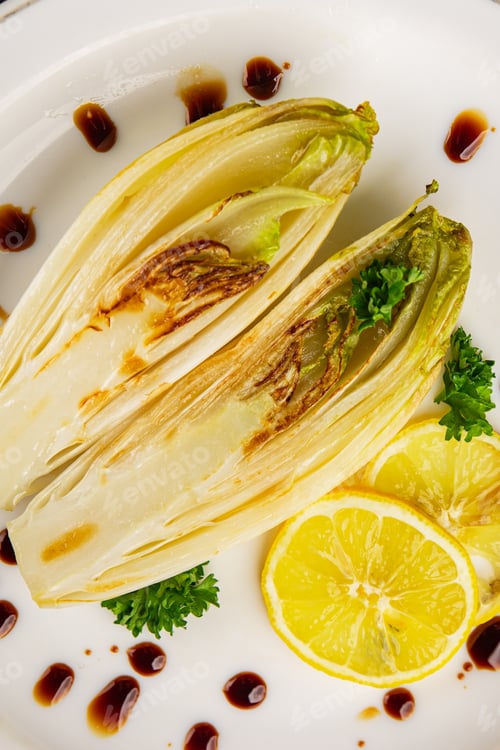 Preview: Chicory roasted or stewed fruit with sauce tasty snack fresh gourmet food background