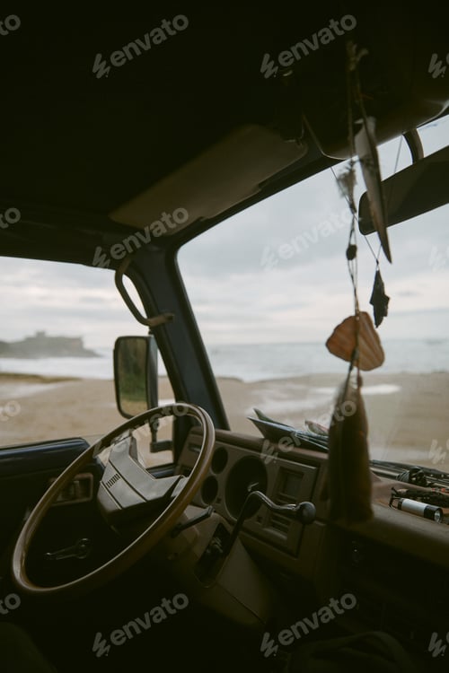 Preview: inside view of a van on road trip at the beach