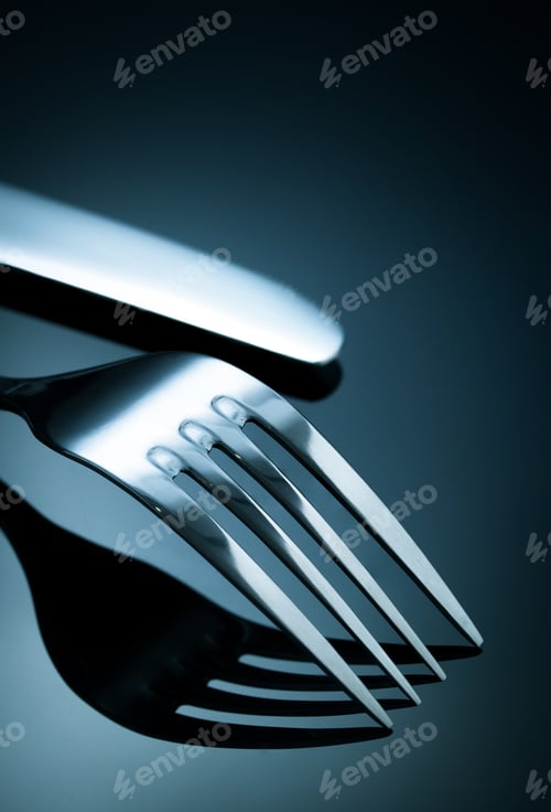 Preview: knife and fork on black
