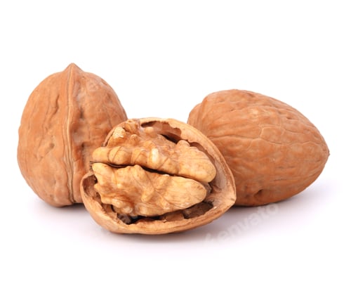 Three Walnuts on a White Surface