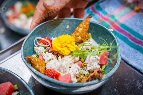 Preview: a close up of a bowl of food with fruit on it