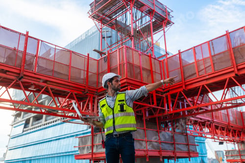Preview: Portrait of an engineer designing a concrete floor and column structure for a shopping center.
