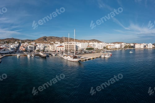 Preview: Tinos island Hora town Cyclades Greece. Aerial drone view of port, sea, blue sky, summer holiday.