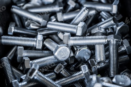 Preview: Close up of metall bolts background. Industrial abstract concept