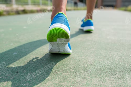 Preview: Woman jogging in a urban city