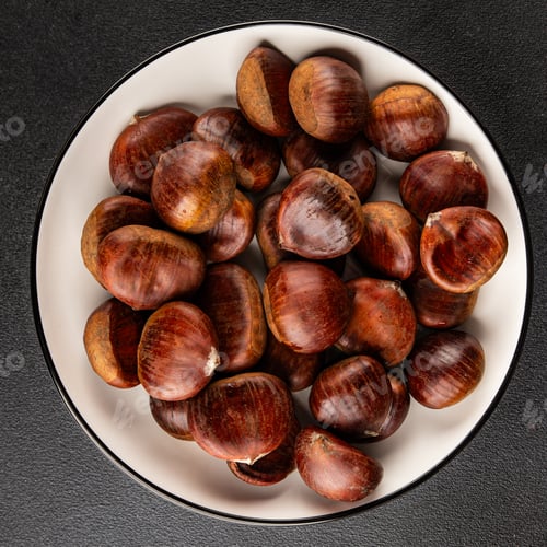 Preview: Edible chestnuts delicious treat tasty snack fresh gourmet food background on table