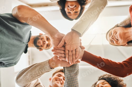 Preview: Businesspeople hands stacked from below.Diverse businesspeople motivating each other. Architects un