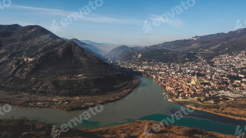 Preview: scenic view of river, mountains and beautiful city in Georgia
