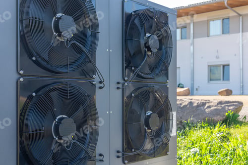 Preview: Commercial air source heat pump system installed outdoors.