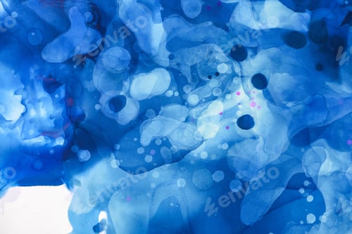 Preview: beautiful textured blue splashes of alcohol ink as abstract background