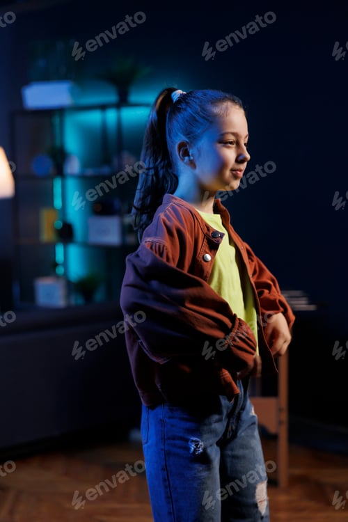 Preview: Cute child enthusiastically performing dancing moves on social media