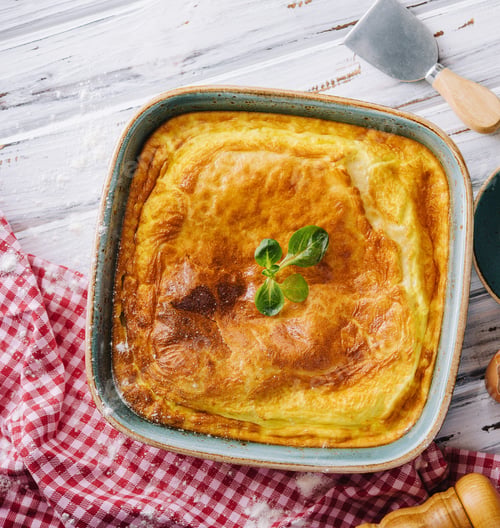 Preview: Delicious pie with meat and basil on wooden table