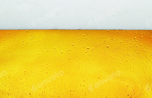 Preview: Close up background texture of lager beer with bubbles and froth in glass.