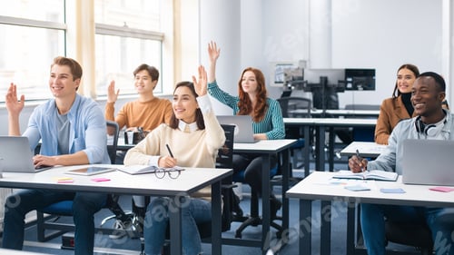 Preview: Portrait of diverse people raising hands at seminar