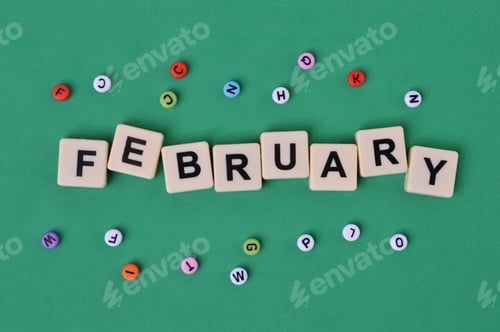 Preview: Alphabet beads and square letters with text text FEBRUARY.