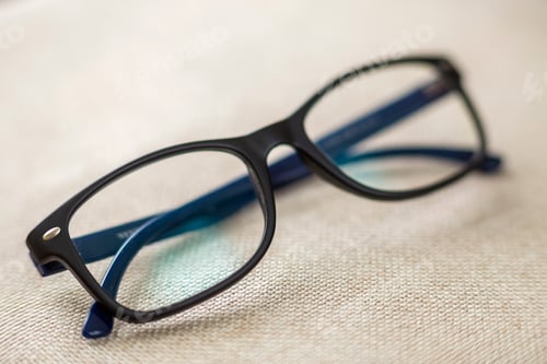 Preview: Reading spectacles, fashionable eyeglasses isolated on blurred white copy space background.