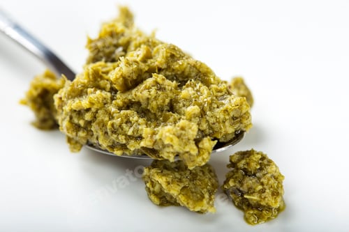 Preview: Spoon of green italian pesto