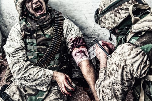 Preview: Military medic binding gunshot wound during fight