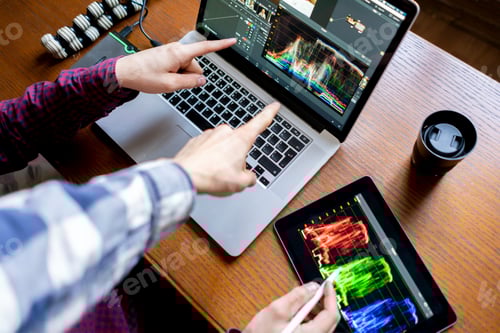 Preview: two men coworking with computer and constructing business plan b