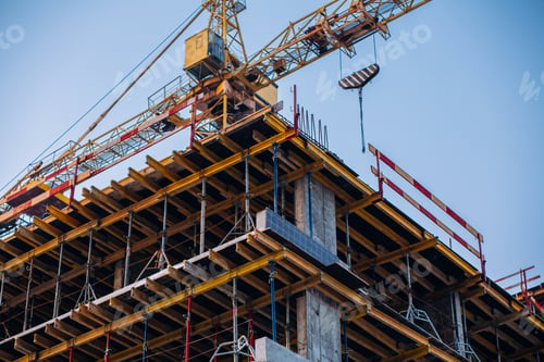 Preview: Crane and building construction site on background of sky