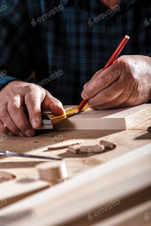 Preview: Senior carpenter working in his workshop.