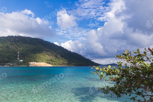 Preview: green tropical island and cloudy sky