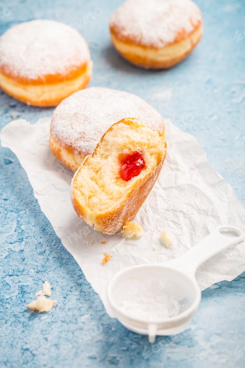 Preview: German donuts - berliner filled with strawberry jam with icing sugar