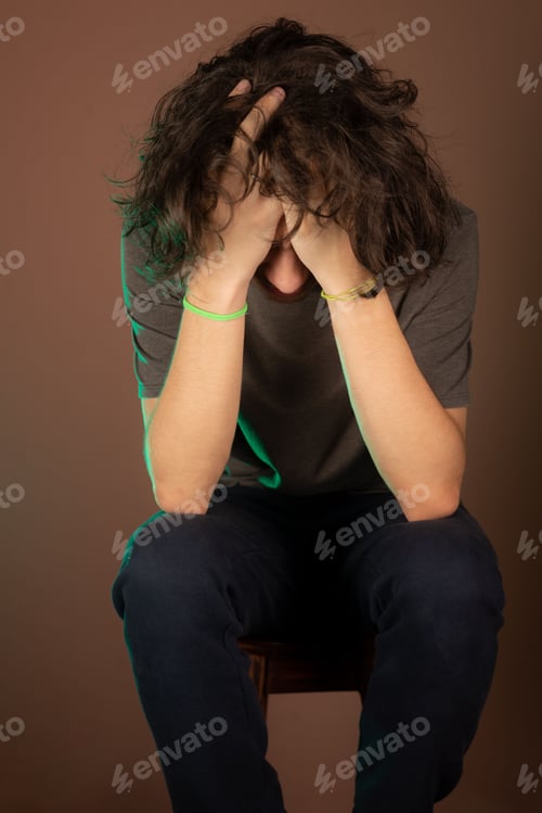 Preview: Close-up image of a thoughtful Caucasian young man