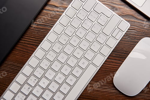 Preview: top view of laptop with wireless keyboard and graphics tablet on graphics designer workplace