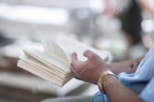 Preview: Man reading book