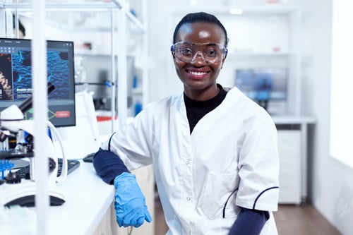 Preview: Portrait of professional african scientist smiling at camera