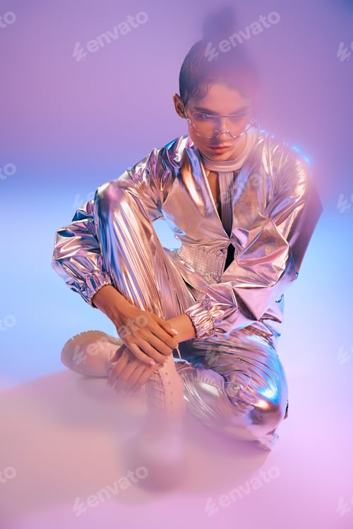 Preview: Futuristic woman enjoying vibrant holographic colors in stylish attire full of modern flair