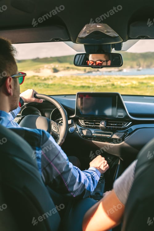 Preview: Young man driving a car