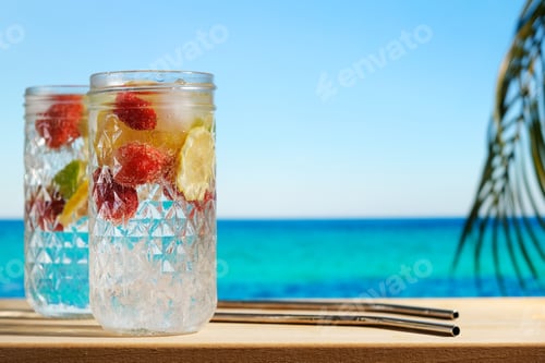 Preview: Hard seltzer cocktails, blue sea on background.