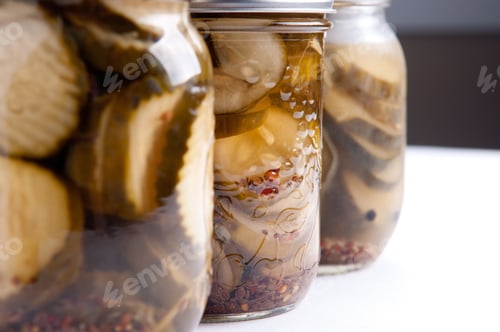 Preview: Closeup shot of three jars with urban digs pickles - perfect for background
