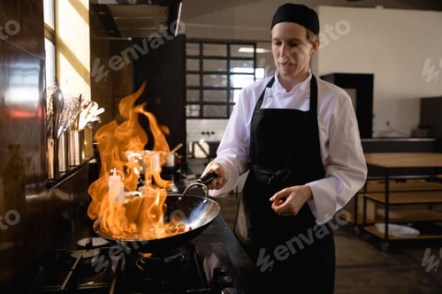 Preview: Caucasian chef cooking with fire