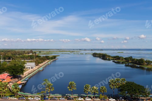 Preview: Aerial view of the tranquil lake surrounded by lush greenery. Nong Han Lake, Thailand.