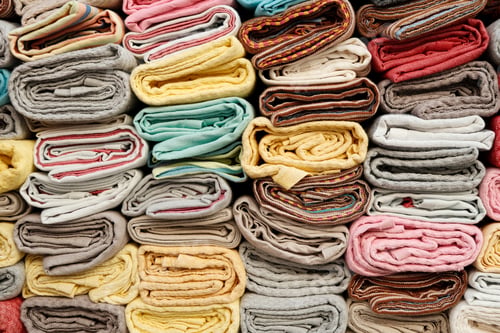 Preview: Colorful background of wrapped textiles