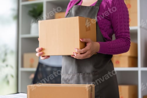 Preview: Packing and Shipping Essentials. An online seller preparing a package for shipment.