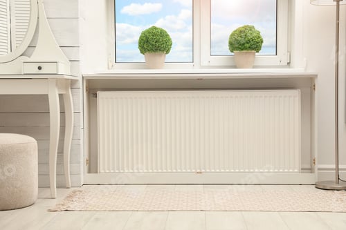 Preview: Modern radiator at home. Central heating system