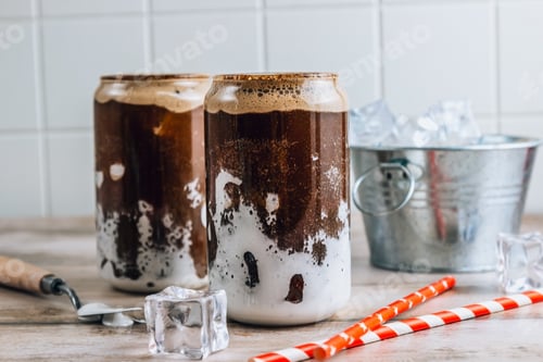 Preview: Iced Coffee Drink in Tall Glassware with Straws