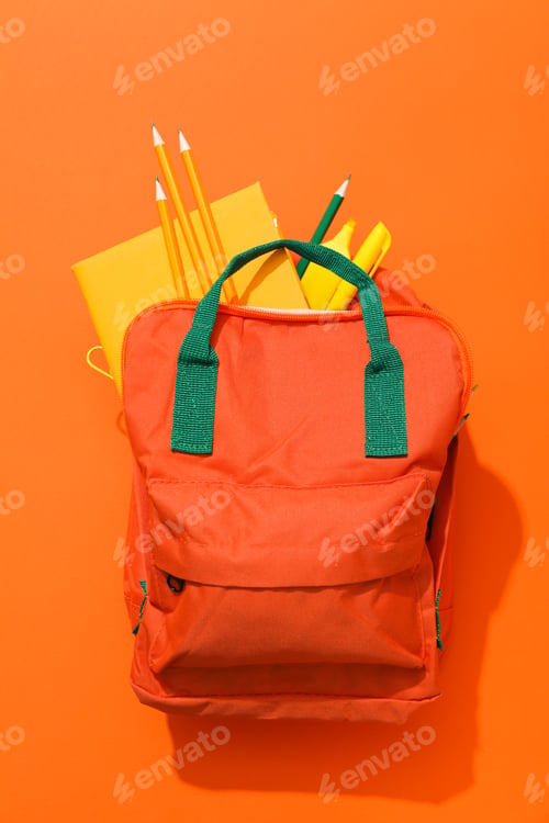 Preview: Concept of school education with school accessories, top view
