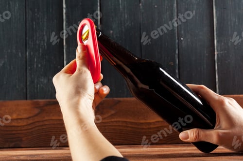 Preview: Glass bottle of beer and opener