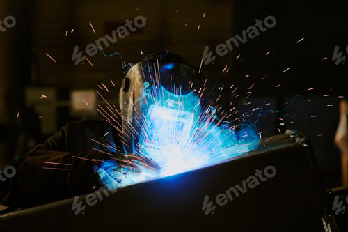 Preview: Professional Welder At Work In Factory
