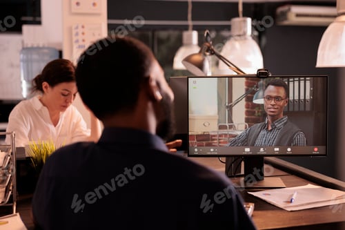 Preview: Employee talking with project manager speaking on corporate videocall