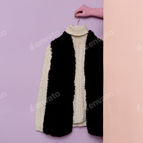Preview: Stylish clothes. Warm sweater and fur vest. wardrobe ideas trend