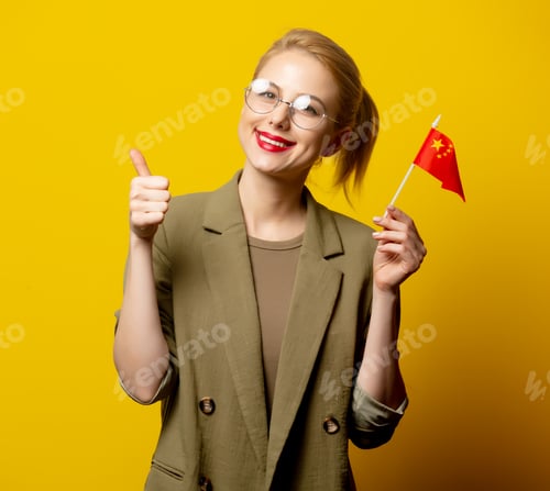 Preview: Style blonde woman in jacket with Chinese flag on yellow background