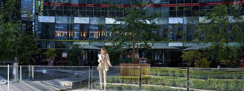 Preview: Corporate businesswoman in beige suit. Silhouette of young corporate woman with documents and