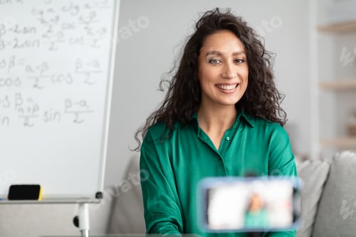 Preview: Teacher explaining math to students, recording video on cellphone