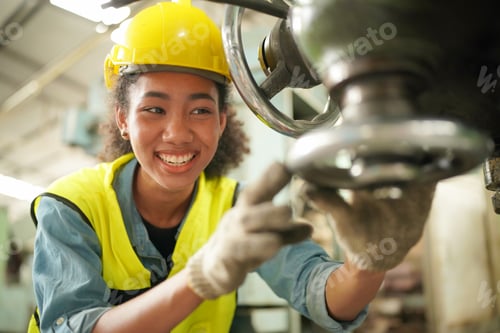 Preview: Female engineers working in industry factory.